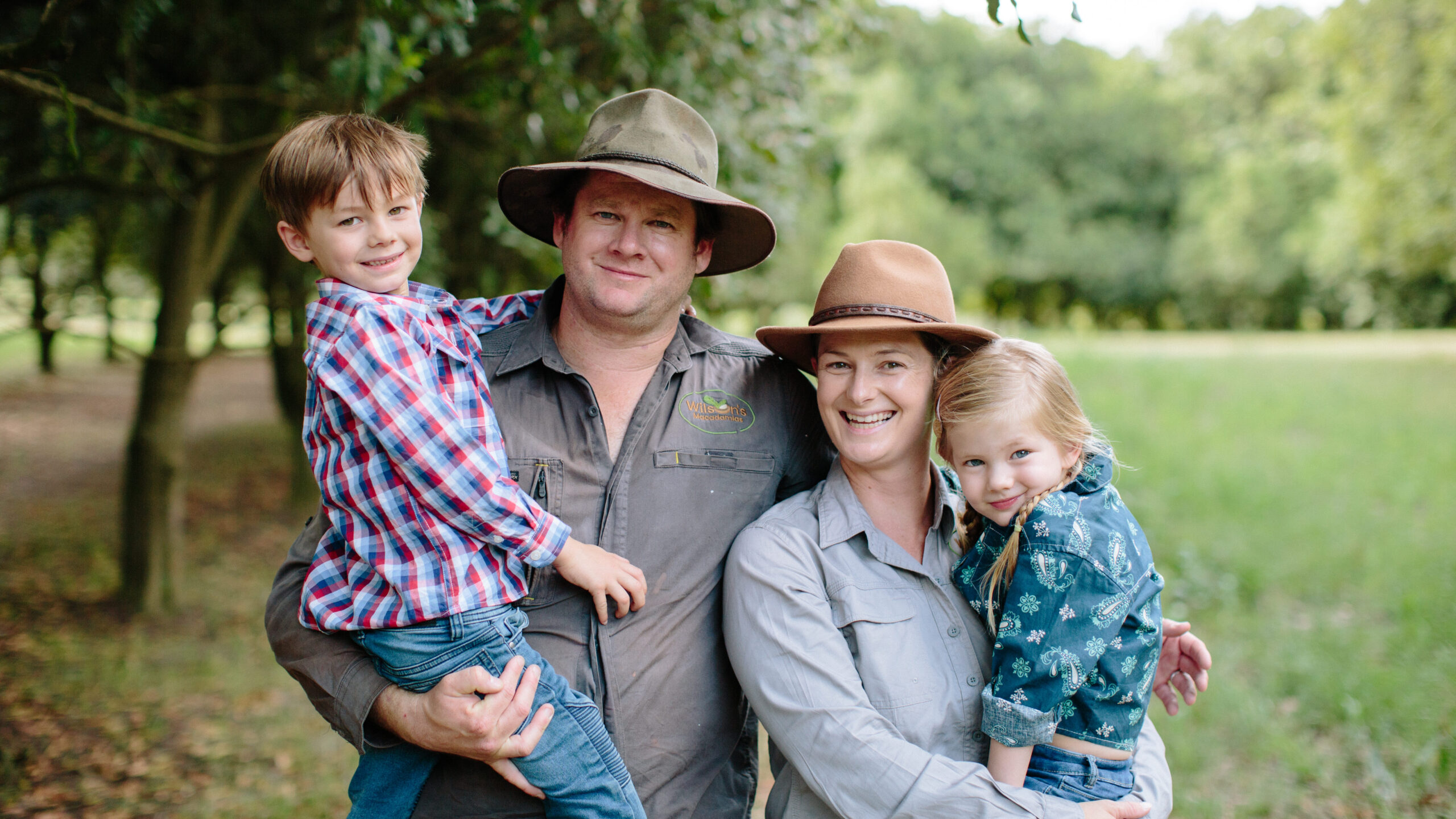 Macadamia farmers Claire and Pat Wilson and kids