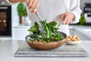 Broccolini and beans with brown butter and roasted macadamias