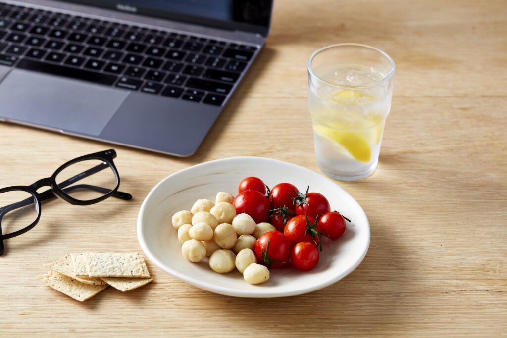 Macadamia and tomato work snack plate