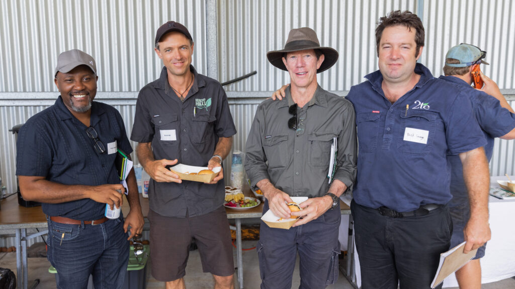 Paul Chapman with others in the macadamia industry