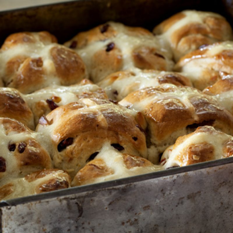 Hot cross buns with macadamias and cranberries