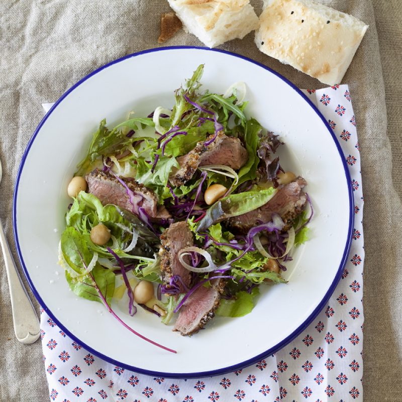 Peppered beef and roast macadamia salad