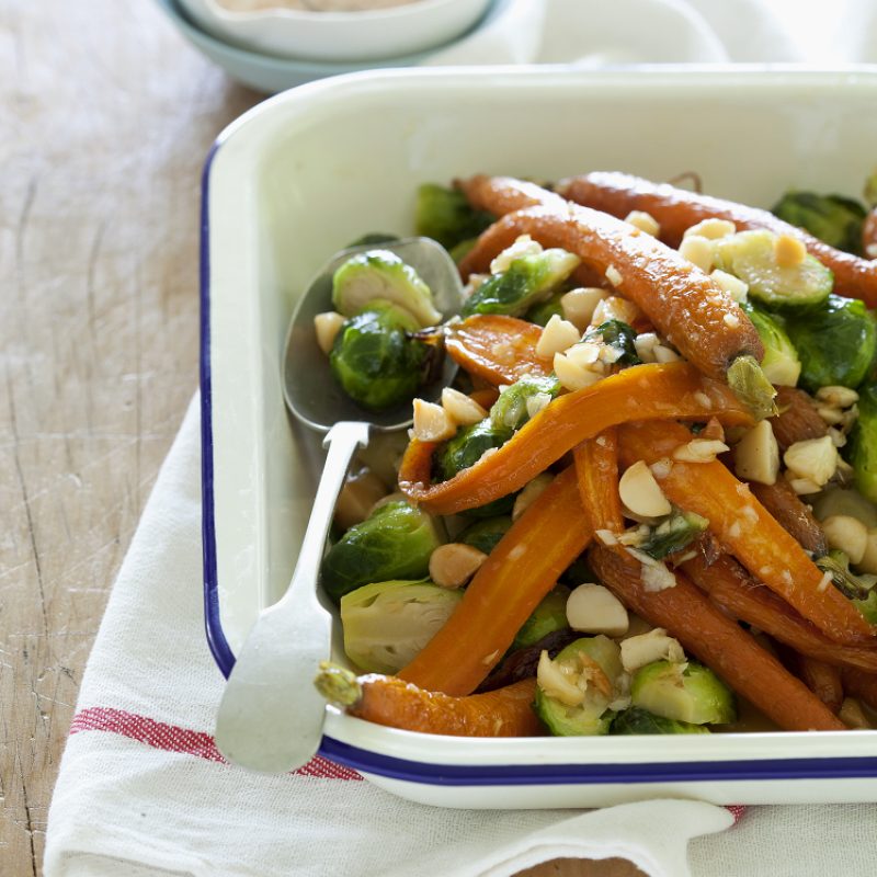 Warm salad of honeyed baby carrots, brussels sprouts and macadamias