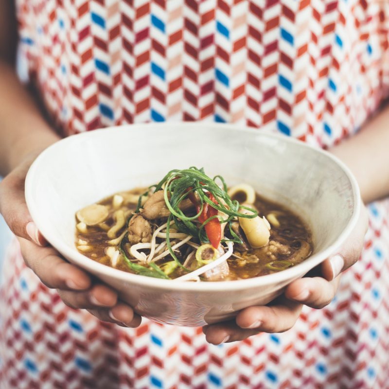 Chicken and macadamia hot and sour noodle soup
