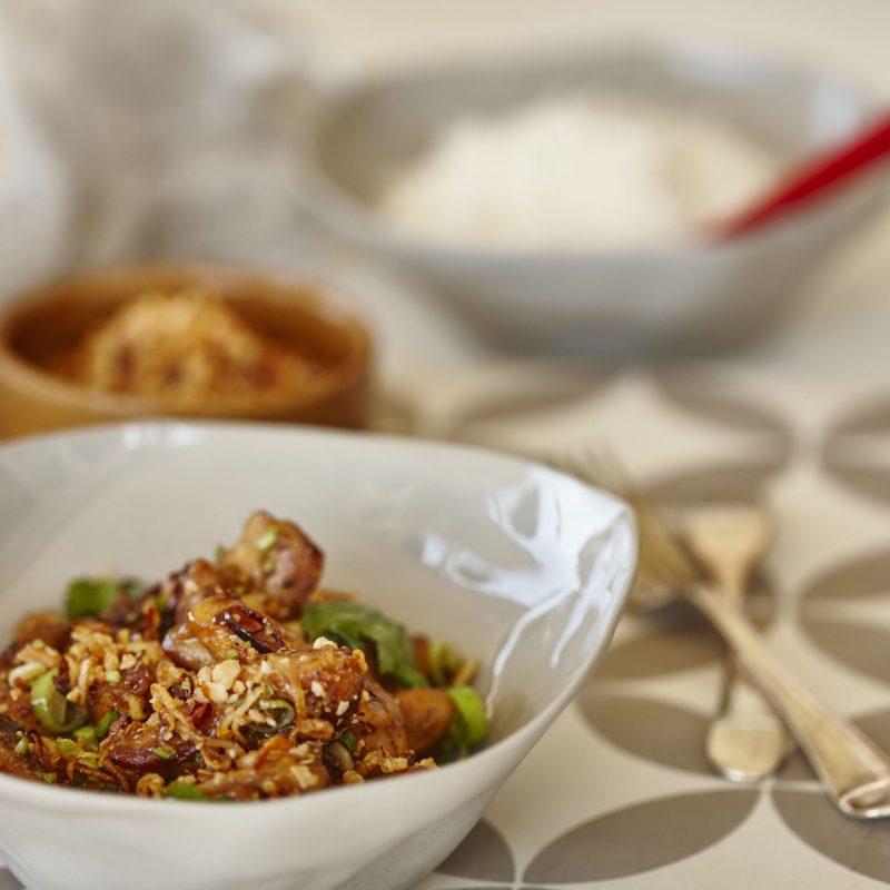 Szechuan chicken with macadamia topping