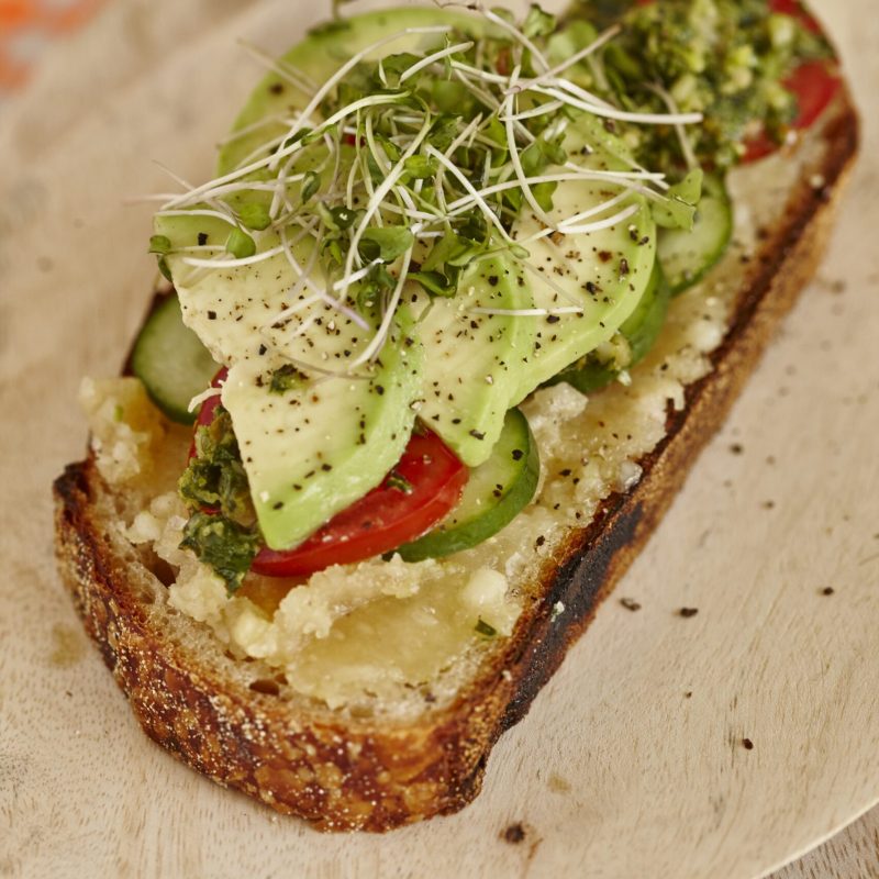 The perfect sandwich with roasted garlic macadamia butter and macadamia salsa verde