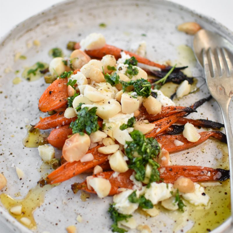 Honey roasted baby carrots with macadamia and goats cheese topping 1