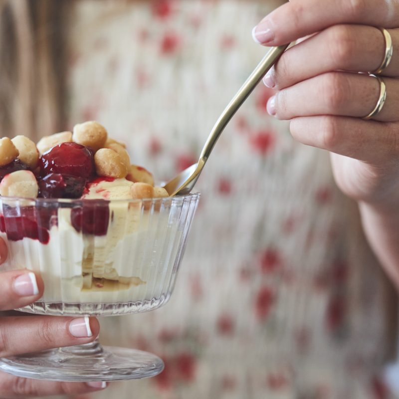 Cherry compote served with roasted macadamia nut pieces