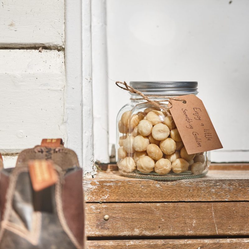 Jar of macadamia nuts on the doorstep